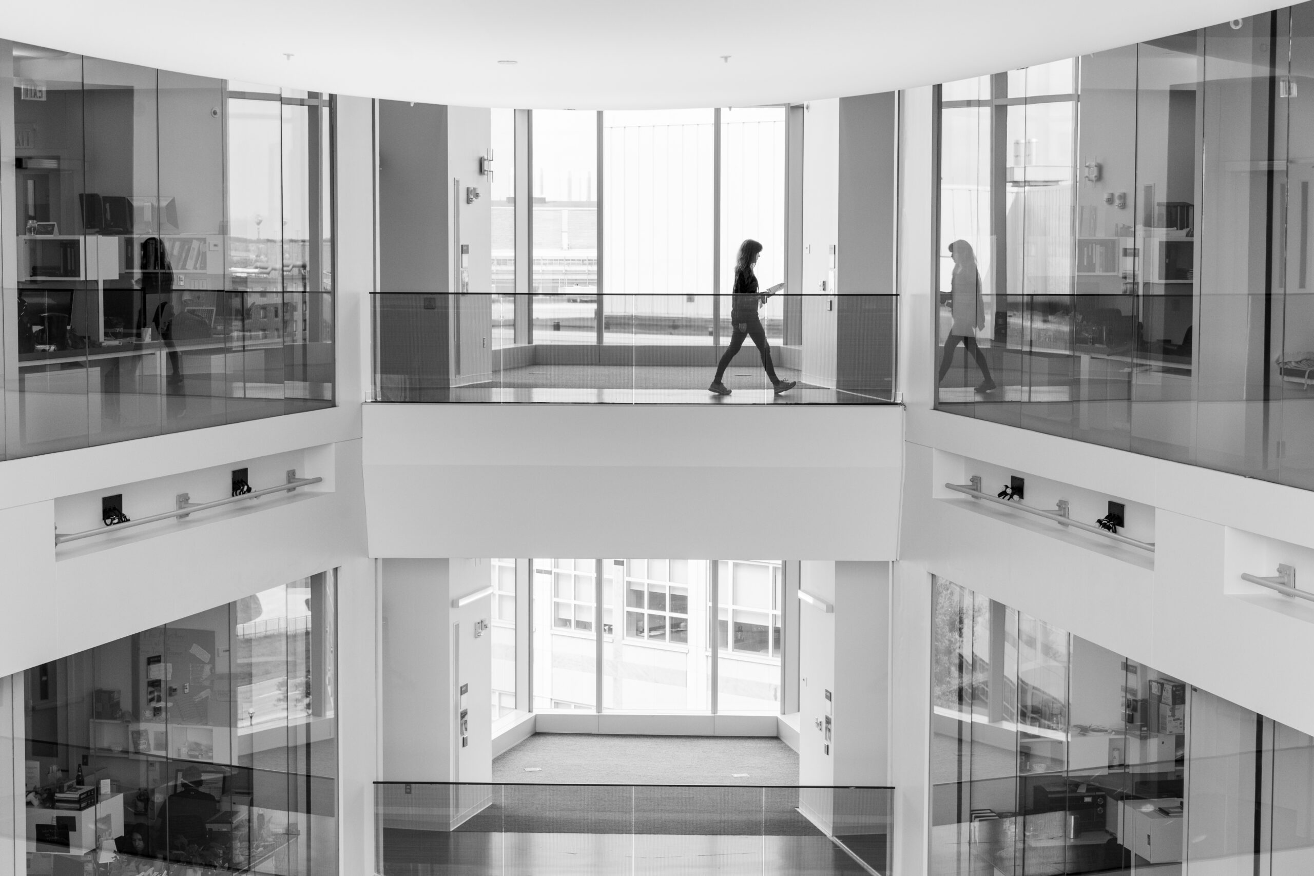 a person walking on a balcony