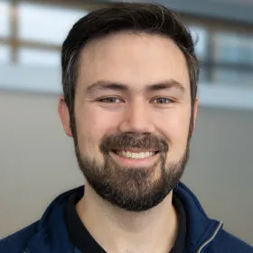 Ajay Larkin headshot